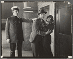 Edward Everett Horton and unidentified others in the motion picture Poker Faces