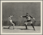 Conrad Nagel fencing with unidentified other in the motion picture The Only Thing
