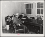 Workmen from Mare Island navy yard in the community room at the FSA (Farm Security Administration) defense housing dormitories. Vallejo, California