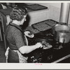 Woodville, California. FSA (Farm Security Administration) farm workers' community. The women's club sells hamburgers at the Saturday night dances