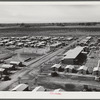 Woodville, California. FSA (Farm Security Administration) farm workers' community. Metal shelters