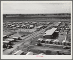 Woodville, California. FSA (Farm Security Administration) farm workers' community. Metal shelters