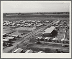 Woodville, California. FSA (Farm Security Administration) farm workers' community. Metal shelters