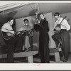 Woodville, California. FSA (Farm Security Administration) farm workers' community. Musicians at the Saturday night dance