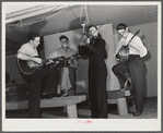 Woodville, California. FSA (Farm Security Administration) farm workers' community. Musicians at the Saturday night dance
