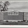 Woodville, California. FSA (Farm Security Administration) farm workers' community. End of the utility building which includes the toilets