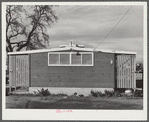 Woodville, California. FSA (Farm Security Administration) farm workers' community. End of the utility building which includes the toilets
