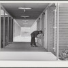 Woodville, California. FSA (Farm Security Administration) farm workers' community. Outside passageways are used wherever possible in the community building