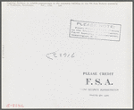 Woodville, California. FSA (Farm Security Administration) farm workers' community. Lighting fixtures in outside passageways in the community building