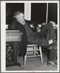Woodville, California. FSA (Farm Security Administration) farm workers' community. Camper attends the camp council meeting