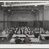 Woodville, California. FSA (Farm Security Administration) farm workers. Meeting of the first aid school in the main auditorium of the community building