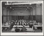 Woodville, California. FSA (Farm Security Administration) farm workers. Meeting of the first aid school in the main auditorium of the community building