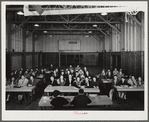 Woodville, California. FSA (Farm Security Administration) farm workers. Meeting of the first aid school in the main auditorium of the community building