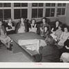 Woodville, California. FSA (Farm Security Administration) farm workers' community. Sewing class in the community building. The teacher is supplied by WPA (Work Projects Administration)