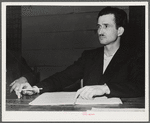 Tulare County, California. FSA (Farm Security Administration) farm workers' camp. Secretary-treasurer of the cooperative store