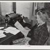 Tulare County, California. FSA (Farm Security Administration) farm workers' camp. Getting out the camp paper