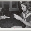 Tulare County, California. FSA (Farm Security Administration) farm workers' camp. Girl Scout knitting