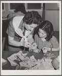 Tulare County, California. FSA (Farm Security Administration) farm workers' camp. Girl Scouts learning to sew