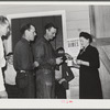 Tulare County, California. FSA (Farm Security Administration) farm workers' camp. Agricultural workers contributing their dimes at the President's birthday ball