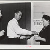 Tulare County, California. FSA (Farm Security Administration) farm workers' camp. Agricultural worker contributing his dime at the President's birthday ball