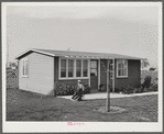 House and son of permanent agricultural worker living at the FSA Farm Workers Community, Woodville, California