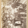 People standing in unidentified building in Japan