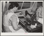 Woodville, California. FSA (Farm Security Administration) farm workers' community. The sewing room for agricultural workers