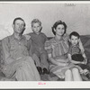 Woodville, California. FSA (Farm Security Administration) farm workers' community. Family of agricultural workers who live in a garden house