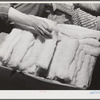 Woodville, California. FSA (Farm Security Administration) farm workers' community. Surplus cotton is used to make quilts, etc