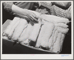 Woodville, California. FSA (Farm Security Administration) farm workers' community. Surplus cotton is used to make quilts, etc