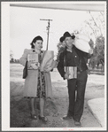 Tulare County, California. Tenant purchase clients' cooperative store. Farmer and his wife bringing groceries from the store