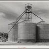 Triple grainery at Casa Grande Farms, FSA (Farm Security Administration) project at Coolidge, Pinal County, Arizona