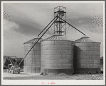 Triple grainery at Casa Grande Farms, FSA (Farm Security Administration) project at Coolidge, Pinal County, Arizona