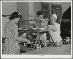 Eleven Mile Corner, Arizona. Cairns General Hospital. FSA (Farm Security Administration) farm workers' community. Preparing lunch. NYA (National Youth Administration) girls help in kitchen