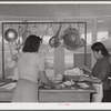 Preparing lunch at the Cairns General Hospital at the FSA (Farm Security Administration) farm workers' community at Eleven Mile Corner, Arizona