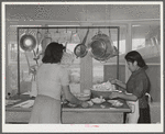 Preparing lunch at the Cairns General Hospital at the FSA (Farm Security Administration) farm workers' community at Eleven Mile Corner, Arizona