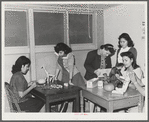 NYA (National Youth Administration) girls who live at the resident center at the FSA (Farm Security Administration) farm workers' community at Eleven Mile Corner, Arizona, learn to use waste materials for toys, jewelry, etc