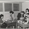 NYA (National Youth Administration) girls who live at the resident center at the FSA (Farm Security Administration) farm workers' community at Eleven Mile Corner, Arizona, learn to use waste materials for toys, jewelry, etc