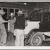 Men build truck back for automobile at the workshop at the FSA (Farm Security Administration) farm workers' community. Eleven Mile Corner, Arizona