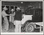 Men build truck back for automobile at the workshop at the FSA (Farm Security Administration) farm workers' community. Eleven Mile Corner, Arizona