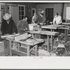 Agricultural workers in the workshop at the FSA (Farm Security Administration) farm workers' community at Eleven Mile Corner, Arizona