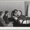 Visitors' hour at the Cairns General Hospital at the FSA (Farm Security Administration) farmworkers' community. Eleven Mile Corner, Arizona