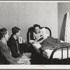 Visitors' hour at the Cairns General Hospital at the FSA (Farm Security Administration) farmworkers' community. Eleven Mile Corner, Arizona