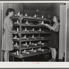 NYA girls deliver the trays at lunchtime at the Cairns General Hospital at the FSA  farm workers' community. Eleven Mile Corner, Arizona. These NYA girls live at the resident center at the FSA camp and receive training as nurses' helpers