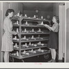 NYA girls deliver the trays at lunchtime at the Cairns General Hospital at the FSA  farm workers' community. Eleven Mile Corner, Arizona. These NYA girls live at the resident center at the FSA camp and receive training as nurses' helpers