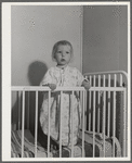 Little girl who is a patient at the Cairns General Hospital at the FSA (Farm Security Administration) farm workers' community at Eleven Mile Corner, Arizona