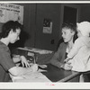 Eleven Mile Corner, Arizona. Cairns General Hospital, FSA (Farm Security Administration) farm workers' community. Registering at the clinic