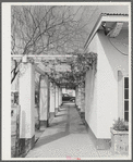 Phoenix, Arizona. Camelback Farms, FSA (Farm Security Administration) project. Open passageway of the community building