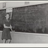 Children learn of the need for well-balanced diet at the school at the FSA (Farm Security Administration) farm workers' community. Eleven Mile Corner, Arizona