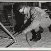 Pinal County, Arizona. Defense training project, U.S. Department of Education. Ranch boys learning welding. This man came to Arizona from Texas, learned welding, and is now working, but comes back to school at night to learn more about the subject